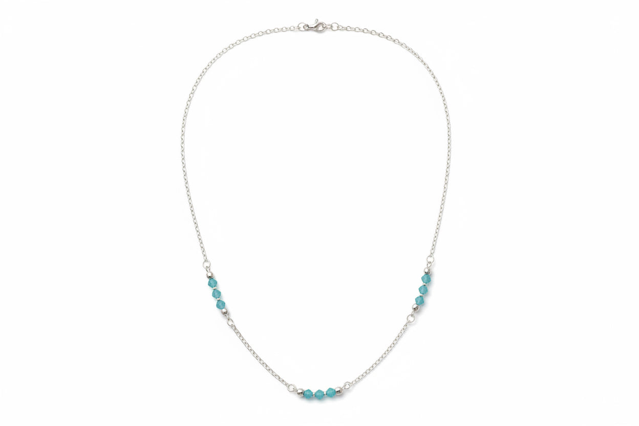 Blue Lagoon Necklace |  Delicate blue crystal beads along a strand of silver.