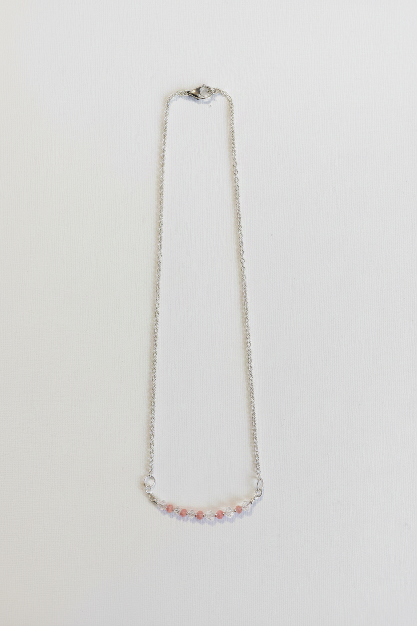 Blush Crystal Necklace - Soft pink and clear crystal beads suspended from a delicate silver-tone necklace