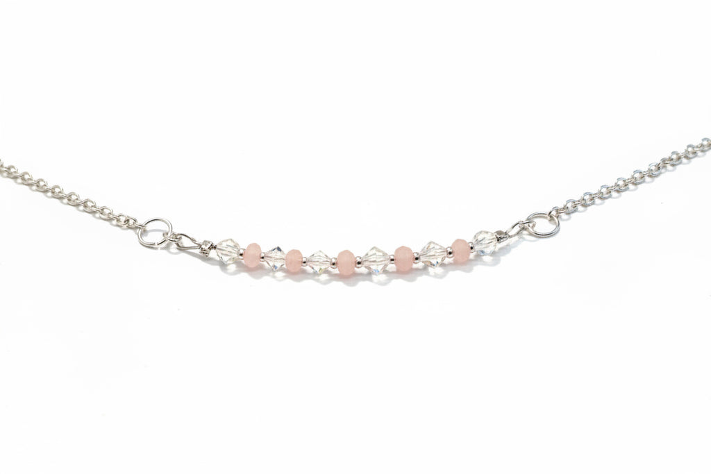 Blush Crystal Necklace - Soft pink and clear crystal beads suspended from a delicate silver-tone necklace
