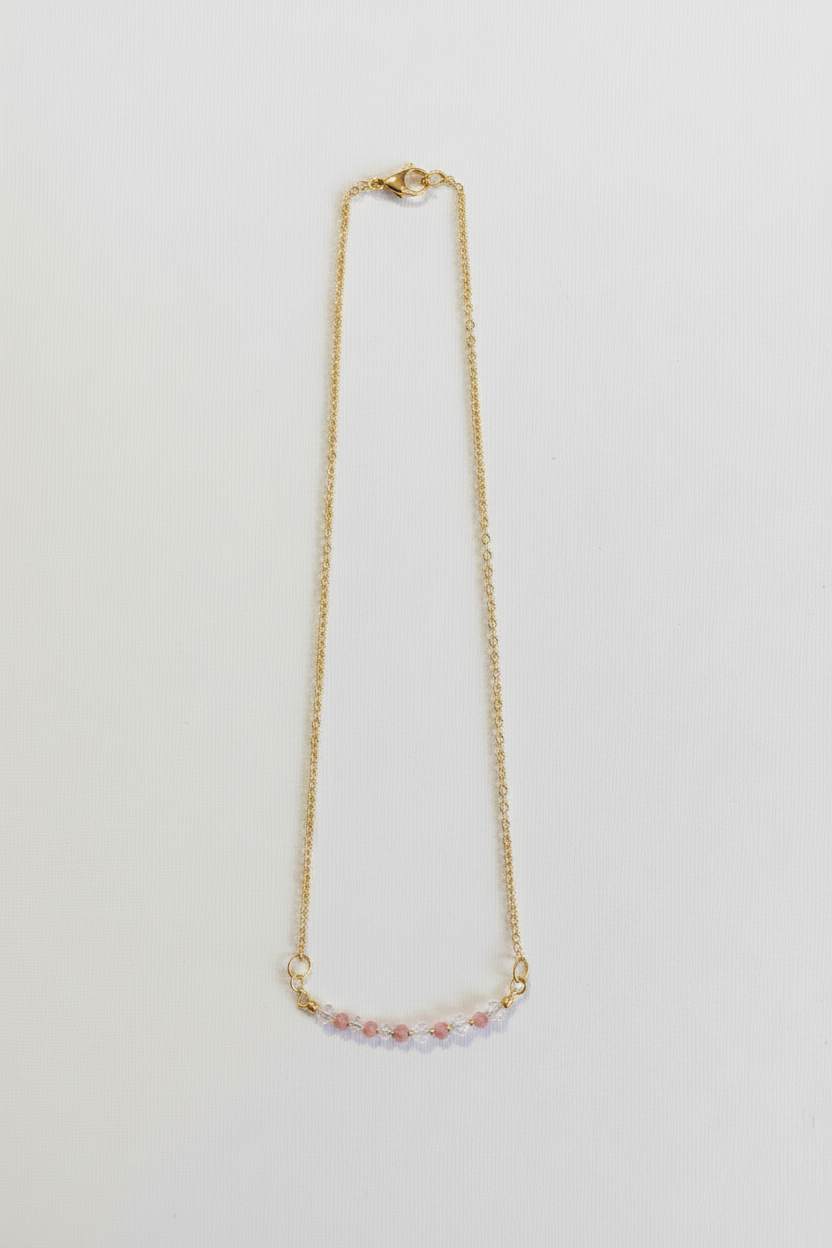 Blush Crystal Necklace - Soft pink and clear crystal beads suspended from a delicate silver-tone necklace