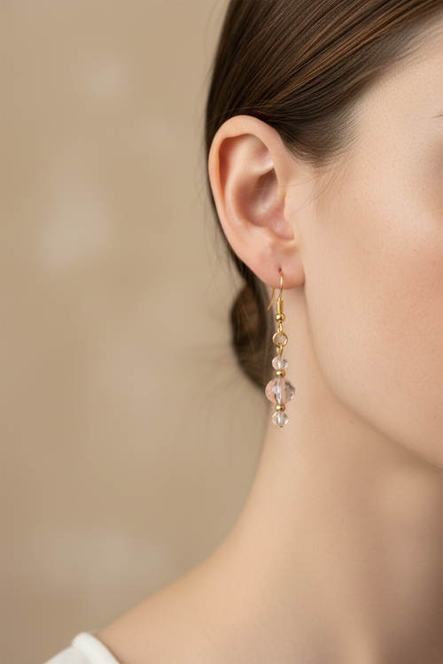 Blush Glow Earrings - Faceted blush-pink bead and gold earrings.