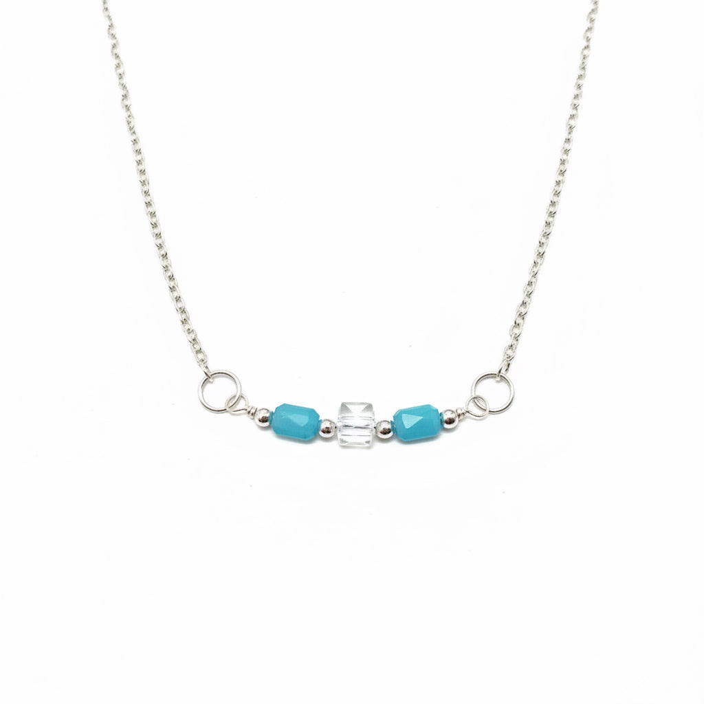 Blue and clear beads on silver chain