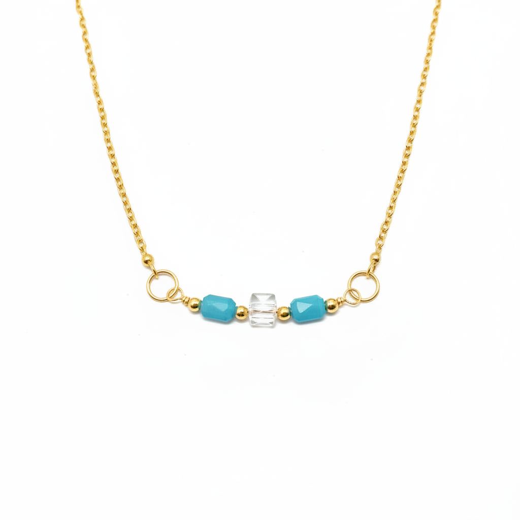 Clearwater Necklace - Blue and clear glass beads suspended from a silver chain.