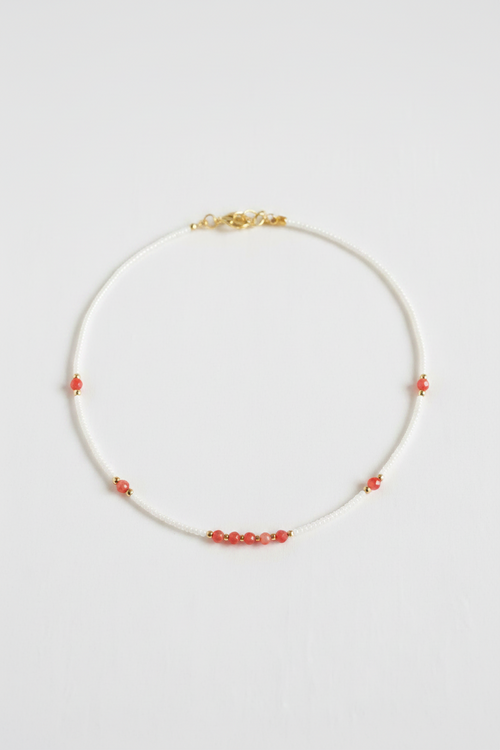 Necklace with coral stone beads