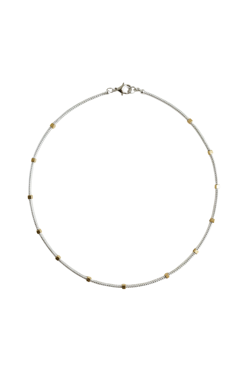 Gold cube beads along strand of silver seed beads.