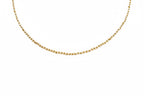 Gold chain necklace on a white background