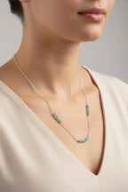 Blue Lagoon Necklace |  Delicate blue crystal beads along a strand of silver.
