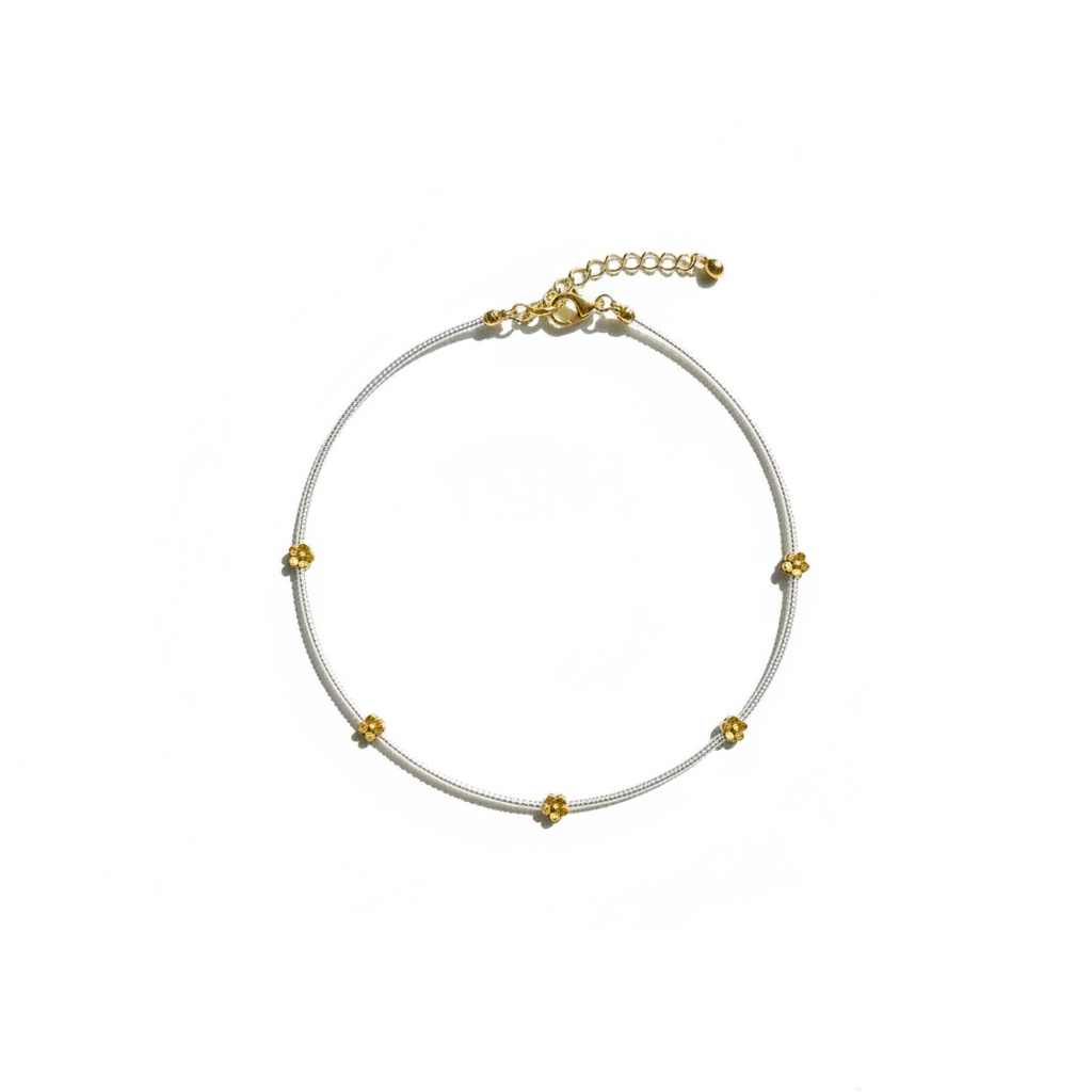 Honey Bloom Necklace - Delicate silver-toned necklace accented with tiny gold flowers.
