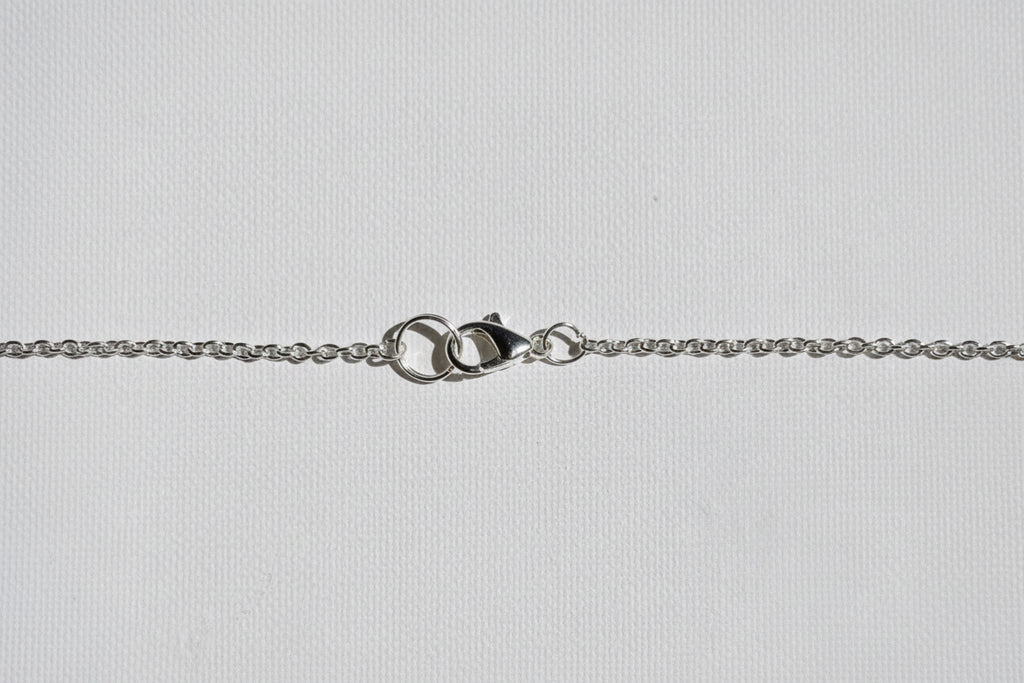 Peony Bloom Necklace, Silver -  Delicate silver chain accented with a row of vibrant raspberry-pink glass beads.