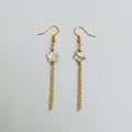 Shell Star Cascade Earrings - Mother-of-Pearl beads paired with delicate gold-tone chain tassels.