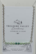 Shades of Green Ombré Necklace - Silver-tone necklace featuring an ombré row of green beads.