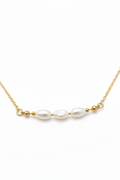 Pearl necklace with gold chain on a white background