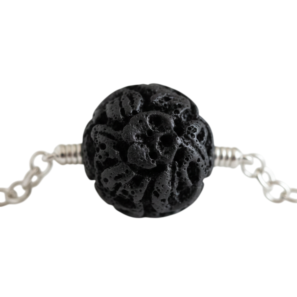 Black textured beaded necklace on a white background