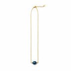 A delicate gold chain necklace featuring a single oval dark blue stone pendant, displayed against a solid white background.