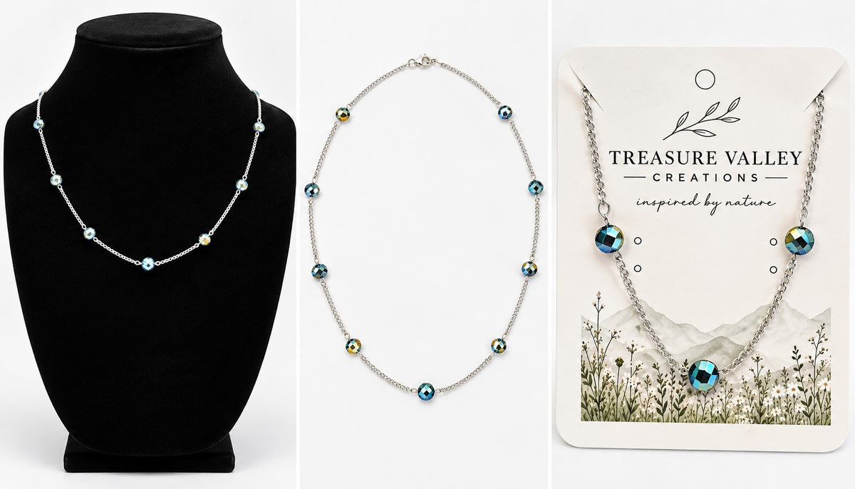 Three views of a silver chain necklace with small round iridescent beads: on a black jewelry bust, laid flat on a white background, and attached to a white Treasure Valley Creations display card.