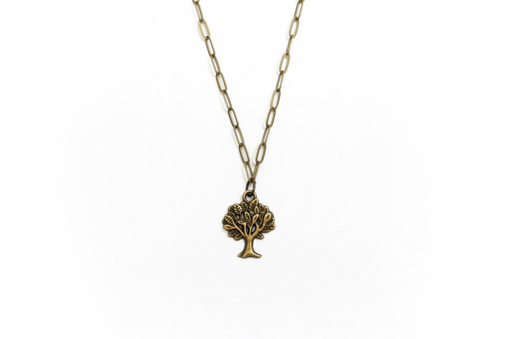 A tree of life pendant necklace with an antique bronze finish, suspended on a matching chain against a plain white background.