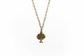 A tree of life pendant necklace with an antique bronze finish, suspended on a matching chain against a plain white background.