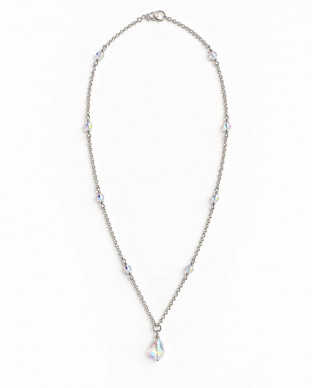 A silver-toned chain necklace with multiple iridescent crystal beads and a teardrop-shaped crystal pendant, displayed on a clean white background.