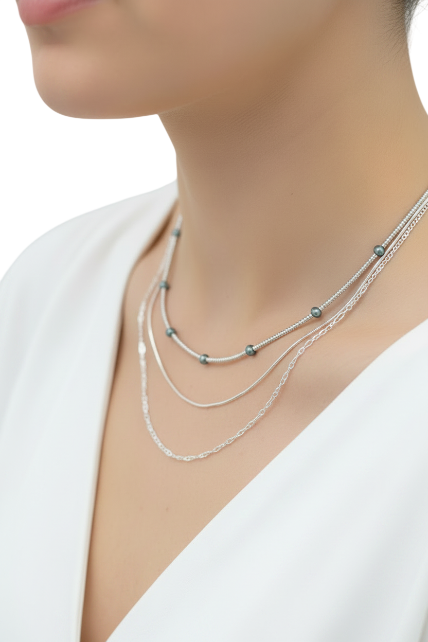 Hidden Cove Necklace | Blue accent beads along a strand of silver.