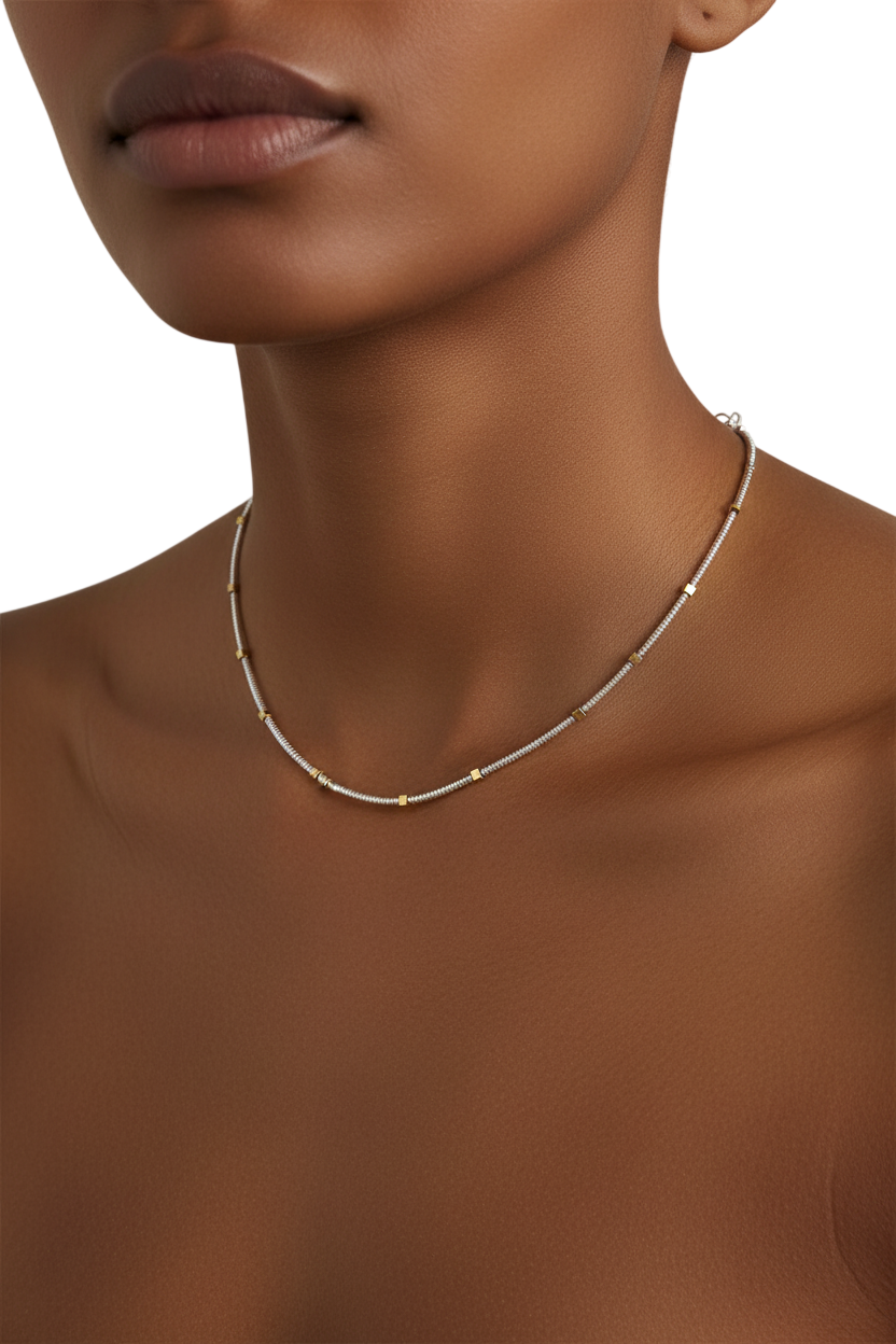 Necklace on a model with a neutral background