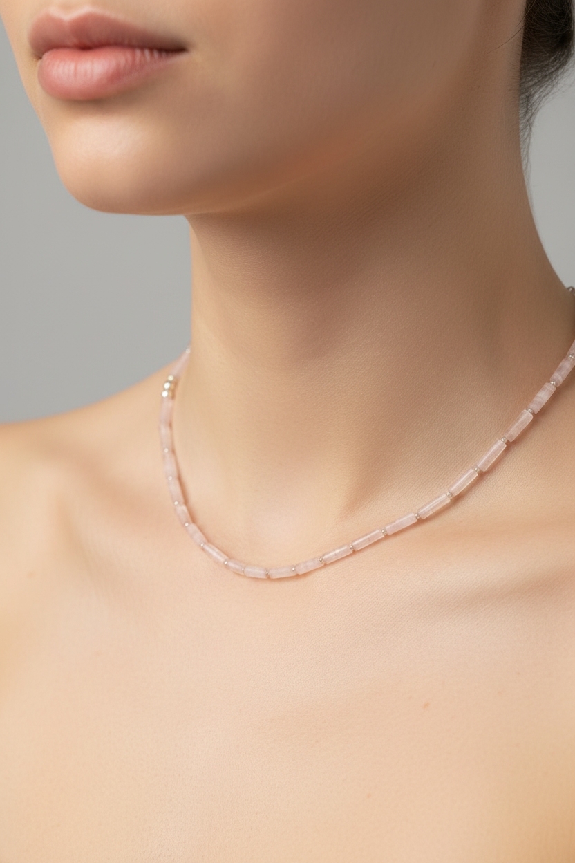Necklace on a model against a neutral background